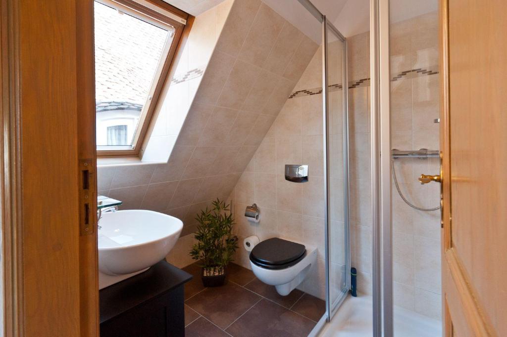 Kúpeľňa v ubytovaní Apartmenthaus im holländischen Viertel