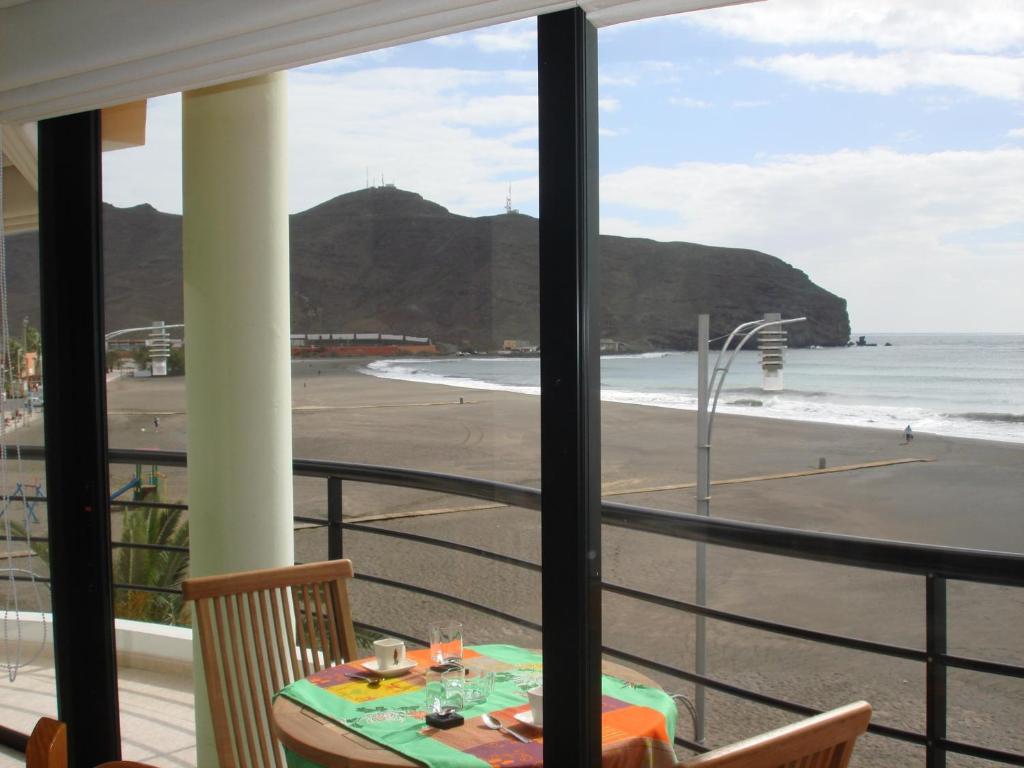 a view of the beach from the balcony of a house at Brisa Mar in Gran Tarajal