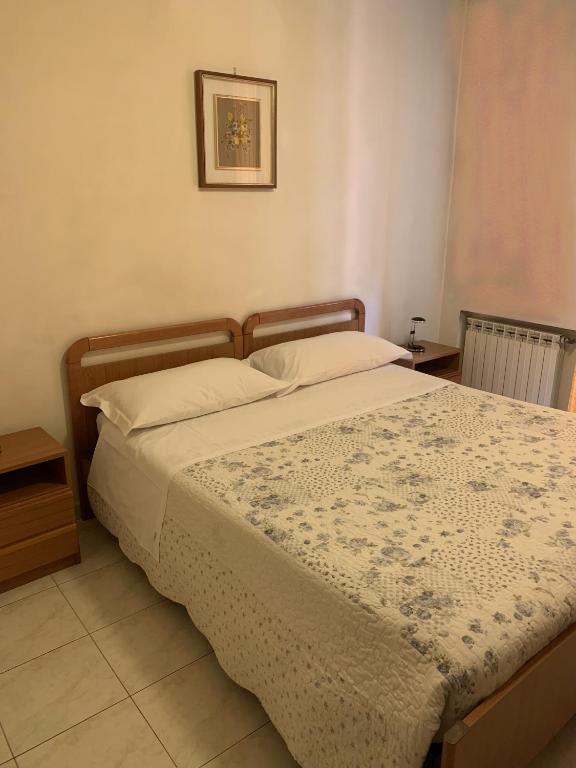 Postel nebo postele na pokoji v ubytování HOTEL ELENA