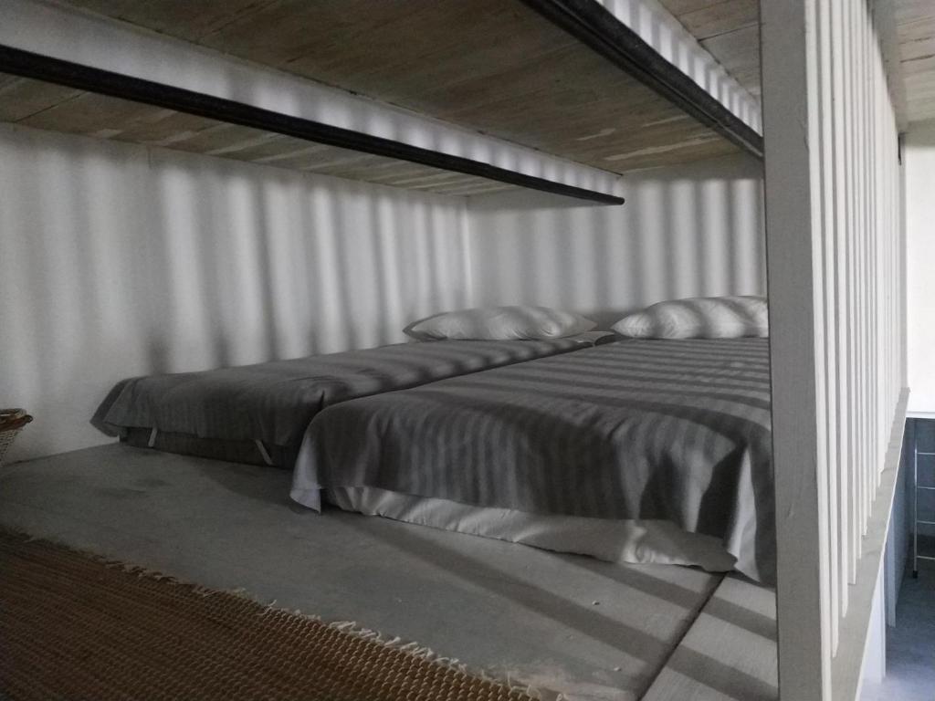 Postel nebo postele na pokoji v ubytování A cà du Pellegrin