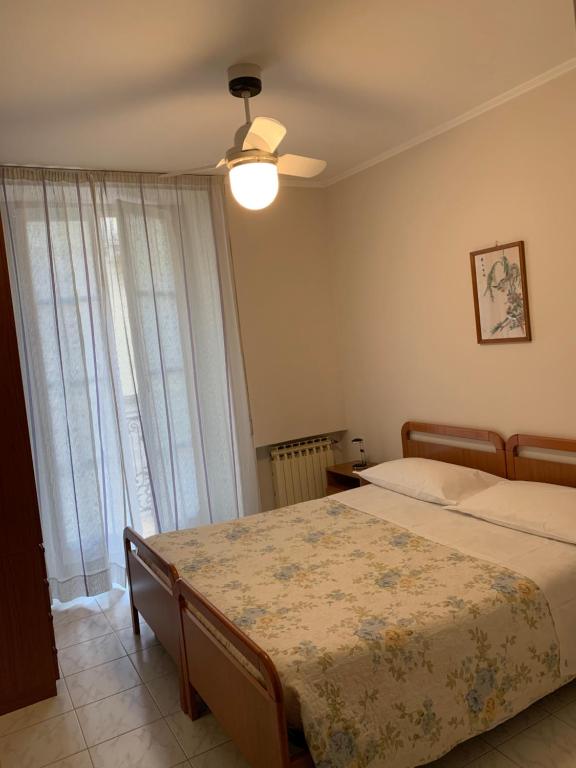 Postel nebo postele na pokoji v ubytování HOTEL ELENA