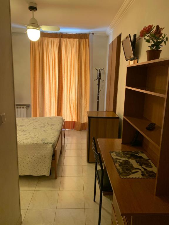 Postel nebo postele na pokoji v ubytování HOTEL ELENA