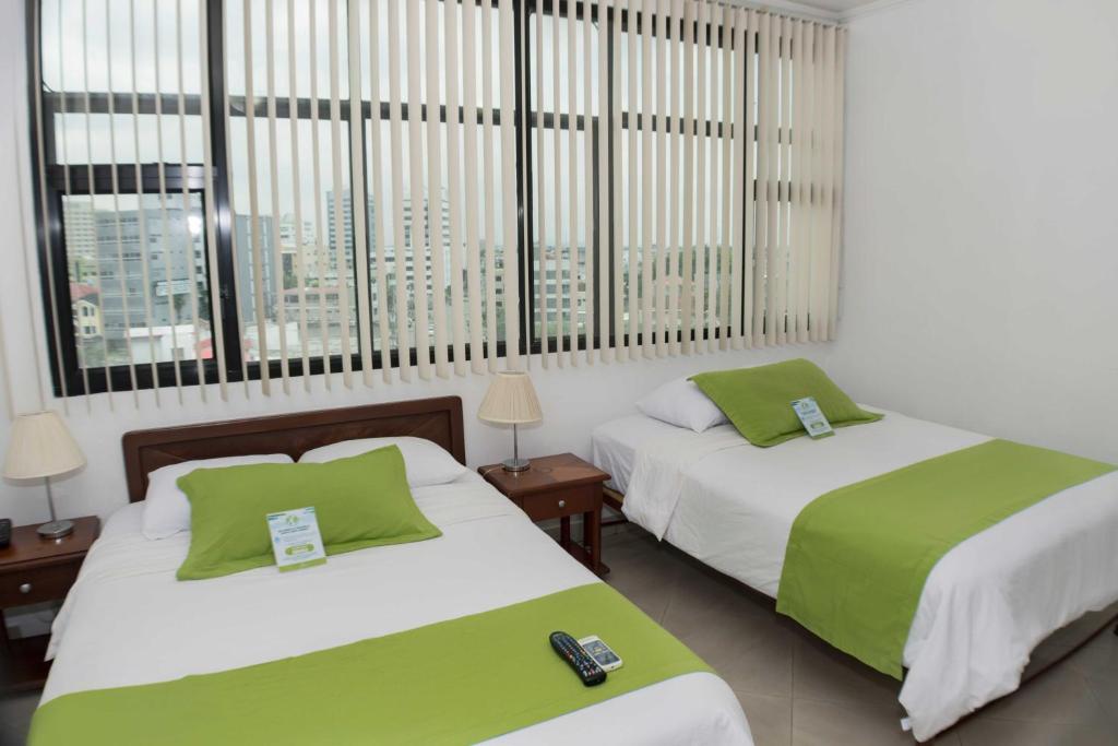 Postel nebo postele na pokoji v ubytování Hotel Castell - Cerca Del Aeropuerto