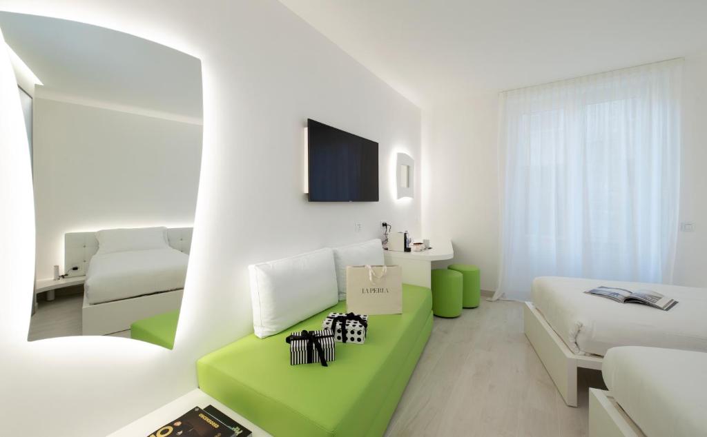 Μια τηλεόραση ή/και κέντρο ψυχαγωγίας στο AHD Rooms