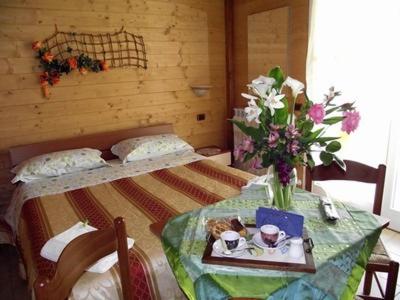 Postel nebo postele na pokoji v ubytování BeB Casa Di Lety