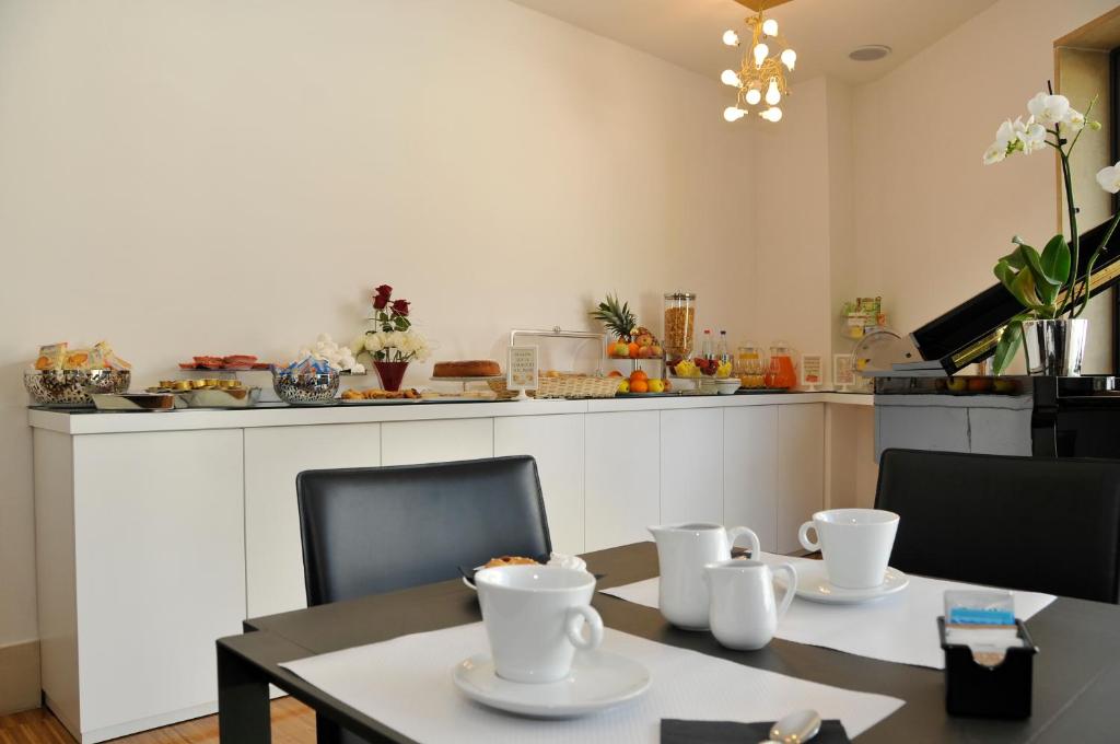 Příslušenství pro přípravu čaje a kávy v ubytování Hotel Del Conte