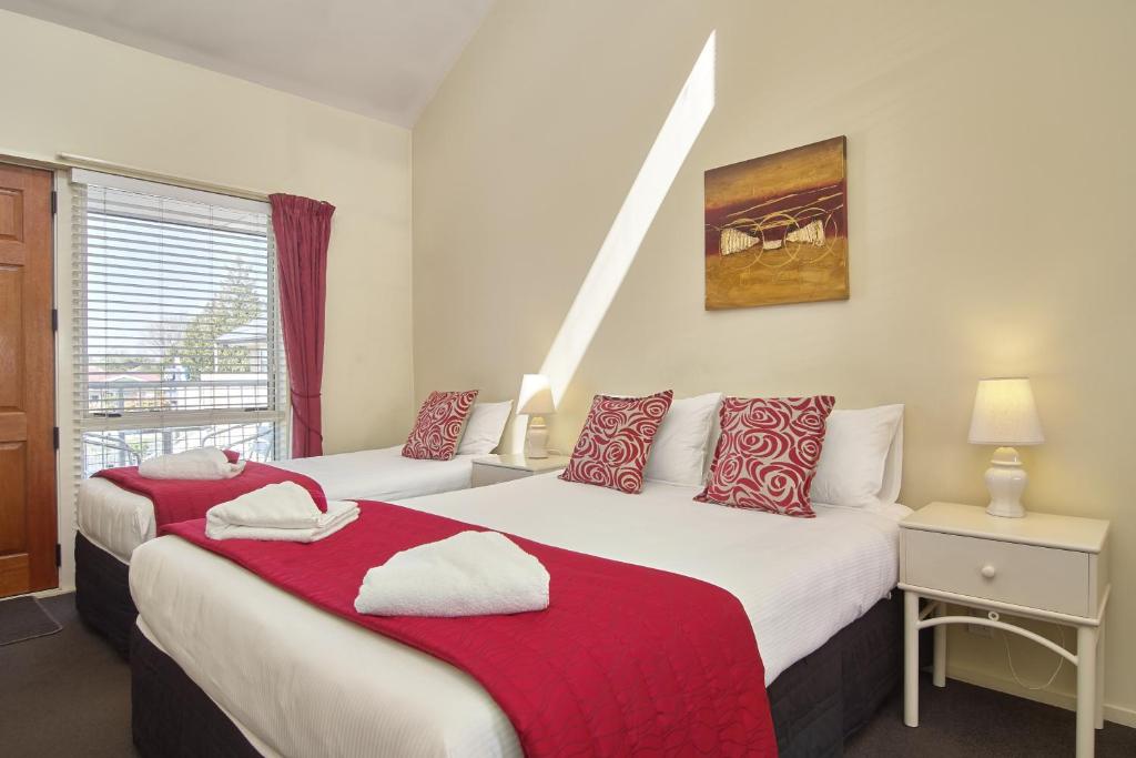 Postel nebo postele na pokoji v ubytování Apollo Motel