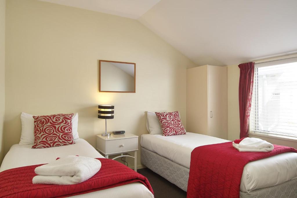 Postel nebo postele na pokoji v ubytování Apollo Motel