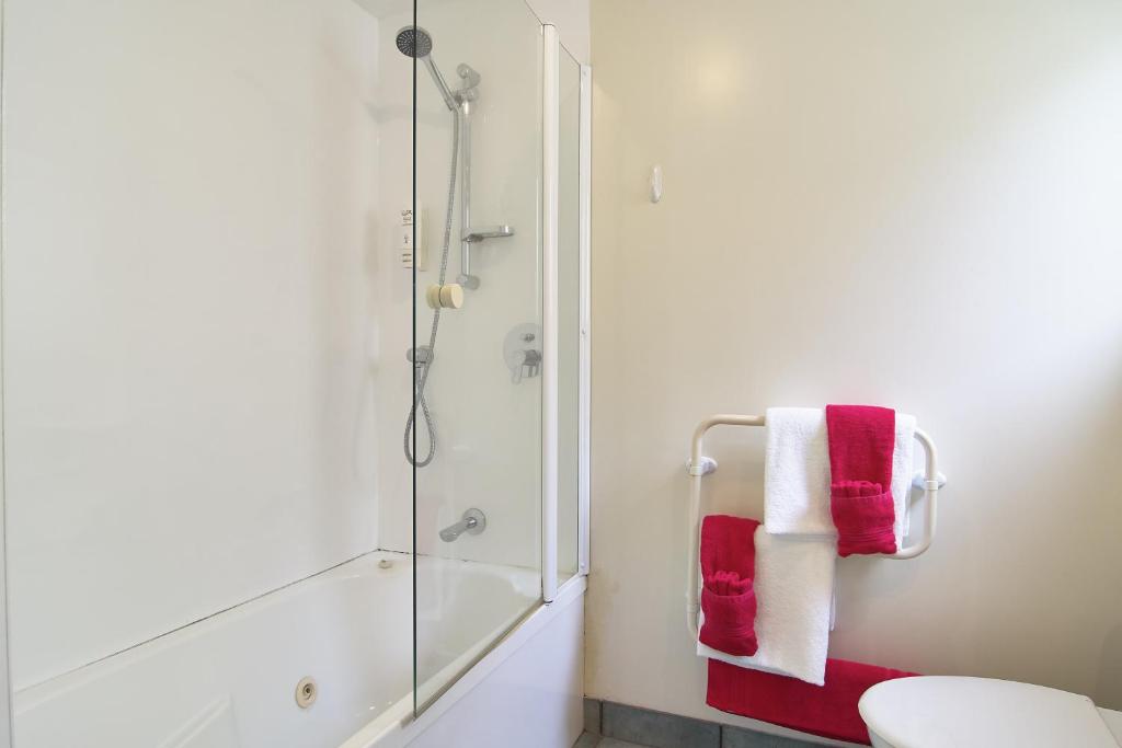 Koupelna v ubytování Apollo Motel