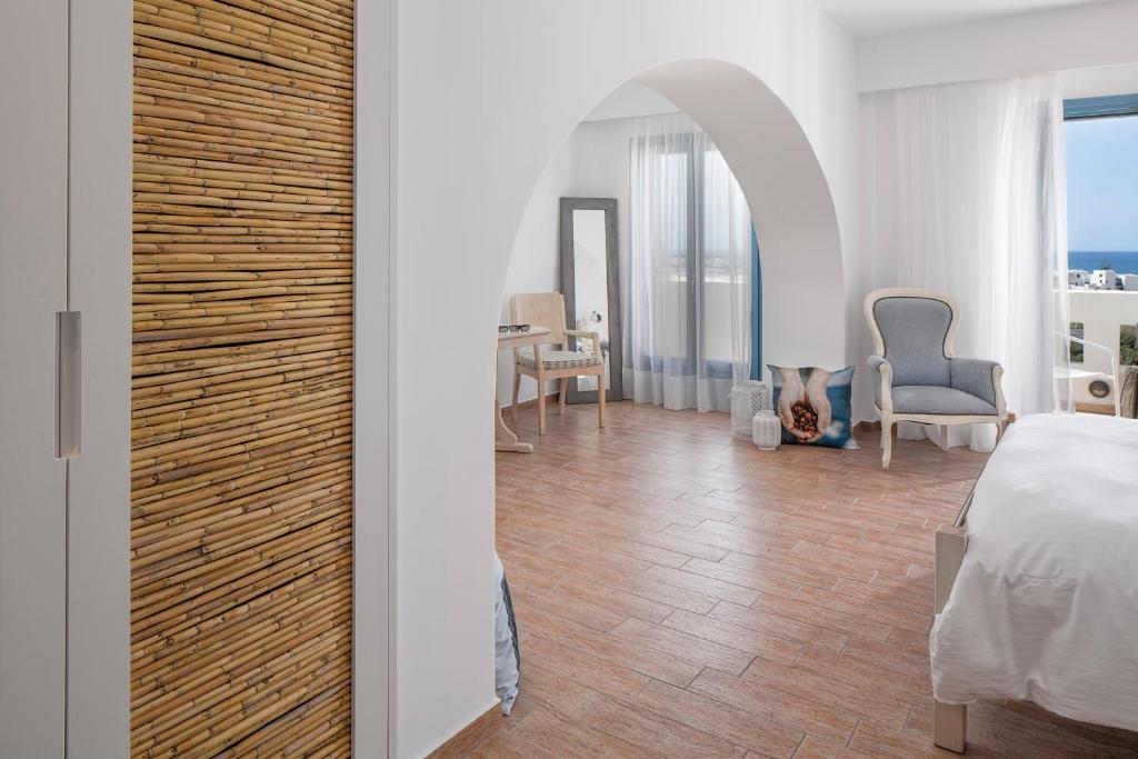 Postel nebo postele na pokoji v ubytování Lagos Mare Hotel