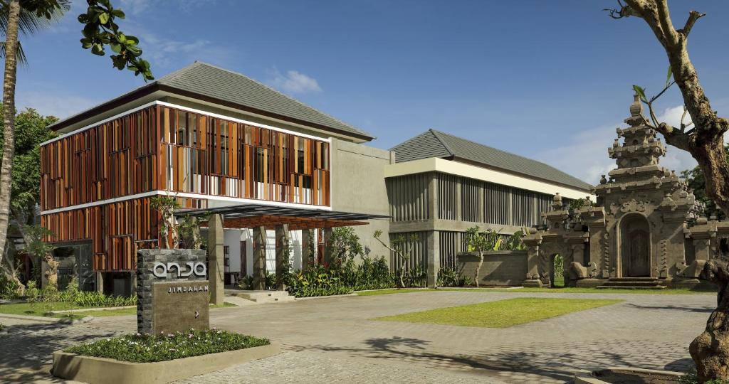 a building with a sign in front of it at Anja Jimbaran in Jimbaran
