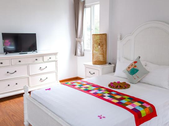 Postel nebo postele na pokoji v ubytování Peach House