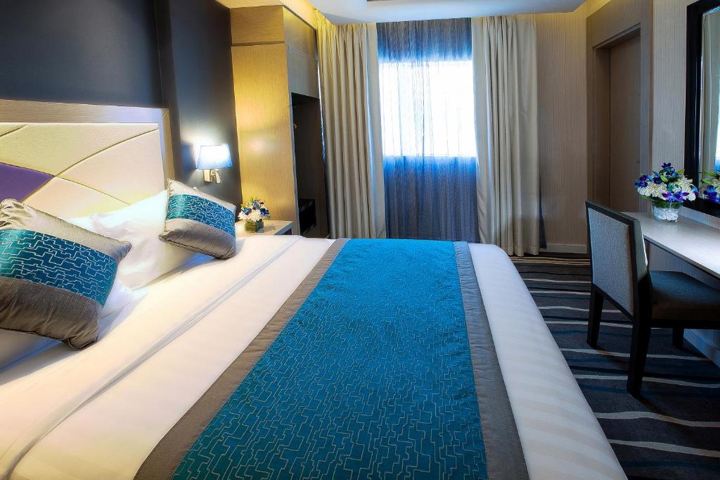 Postel nebo postele na pokoji v ubytování Al Sarab Hotel