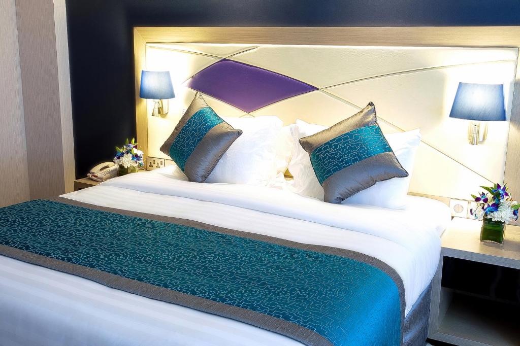 Postel nebo postele na pokoji v ubytování Al Sarab Hotel