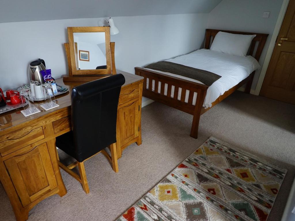 Postel nebo postele na pokoji v ubytování Trotternish B&B