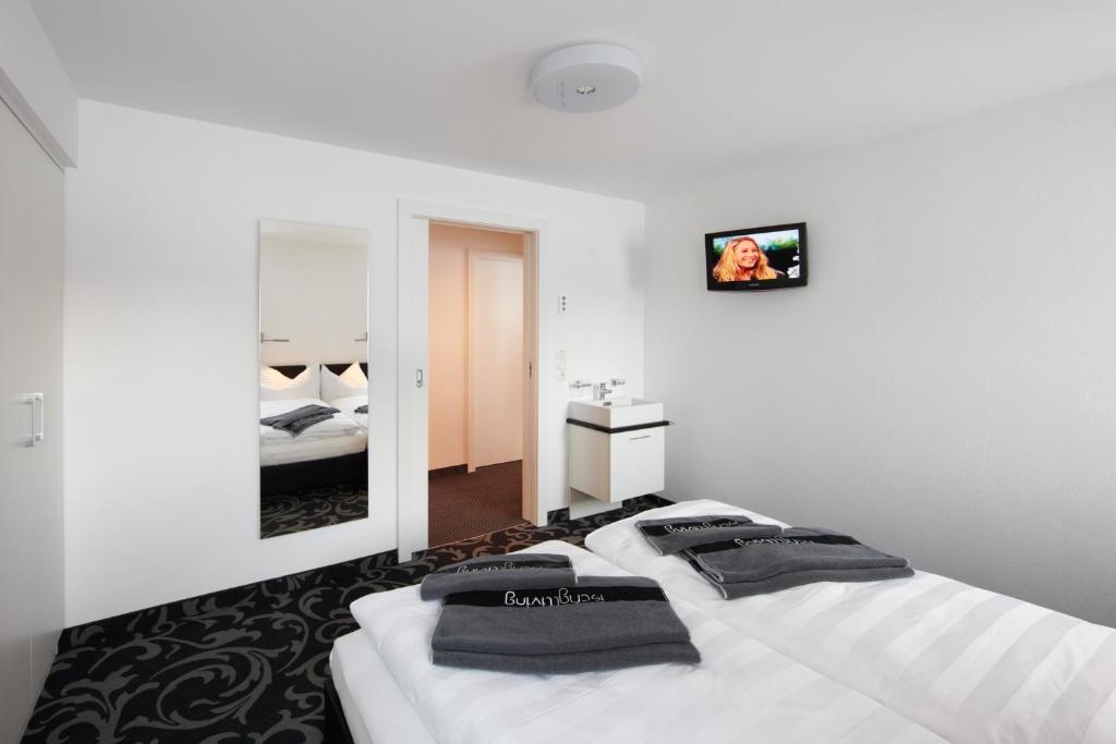 Postel nebo postele na pokoji v ubytování Ischglliving Family Appartements