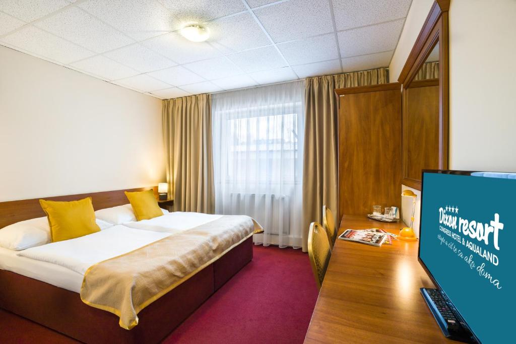 Postel nebo postele na pokoji v ubytování Dixon Resort