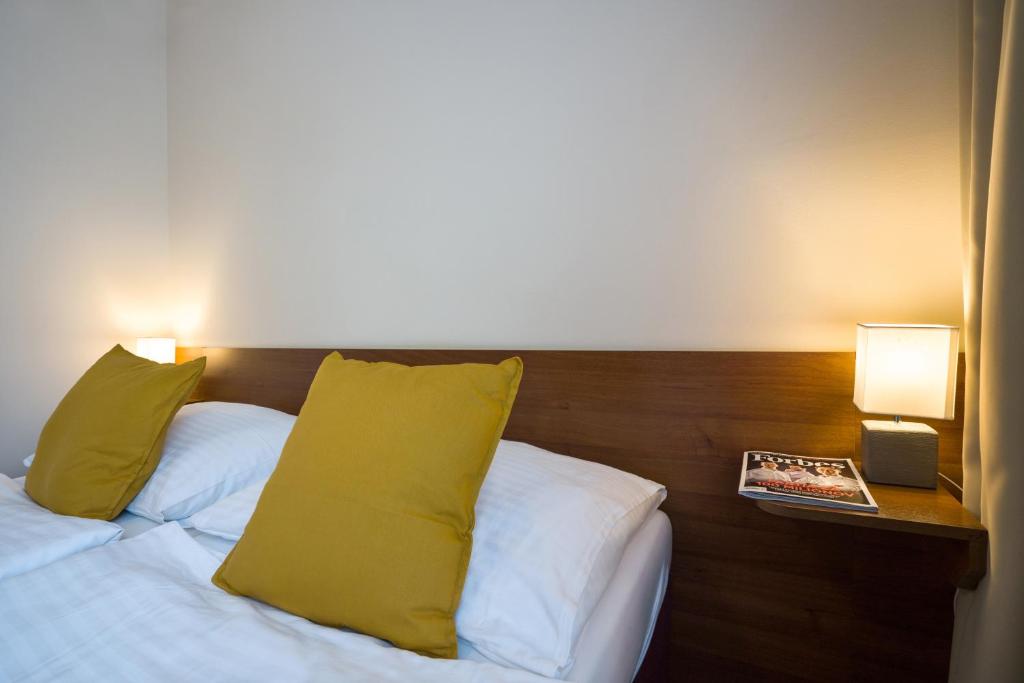 Postel nebo postele na pokoji v ubytování Dixon Resort