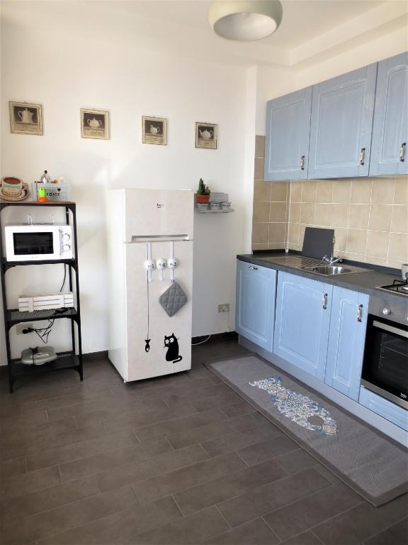 Kuchyň nebo kuchyňský kout v ubytování Quarto di Luna