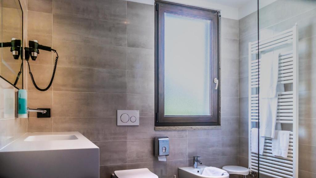 Koupelna v ubytování Hotel Smeraldo