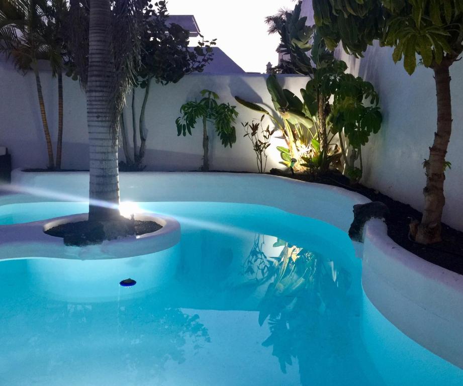 Bazén v ubytování Villa lujo tranquila con piscina a 5 min playa nebo v jeho okolí
