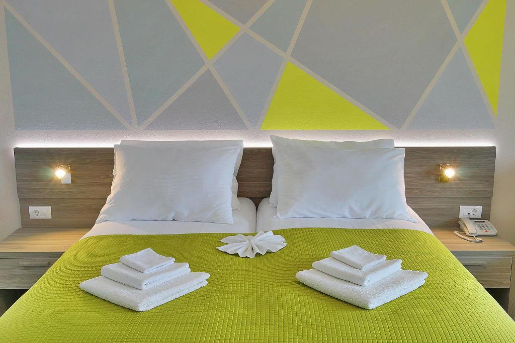 Postel nebo postele na pokoji v ubytování Hotel Modo