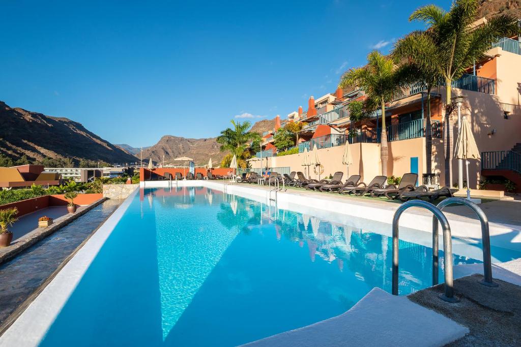 The swimming pool at or close to Apartamentos Cordial Mogán Valle