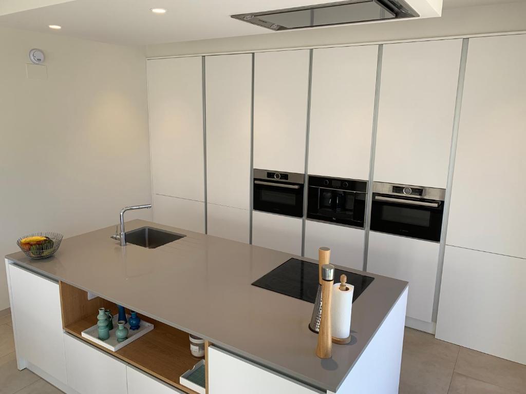 A kitchen or kitchenette at Villa las Colinas Golf Resort