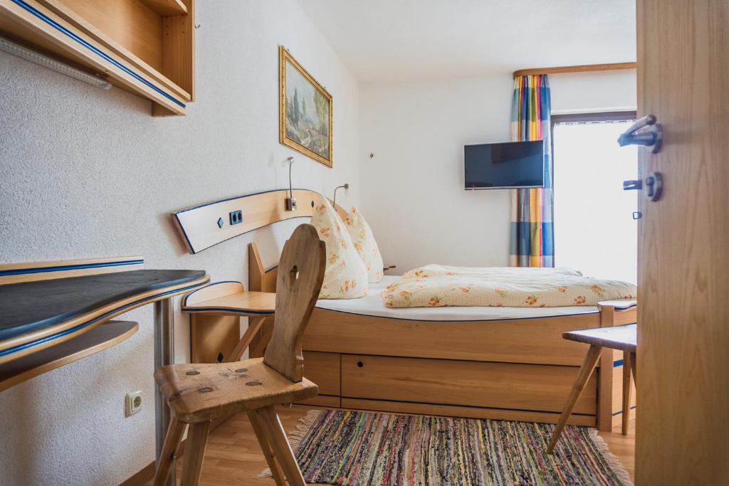 TV a/nebo společenská místnost v ubytování Gasthof Kornbachtal