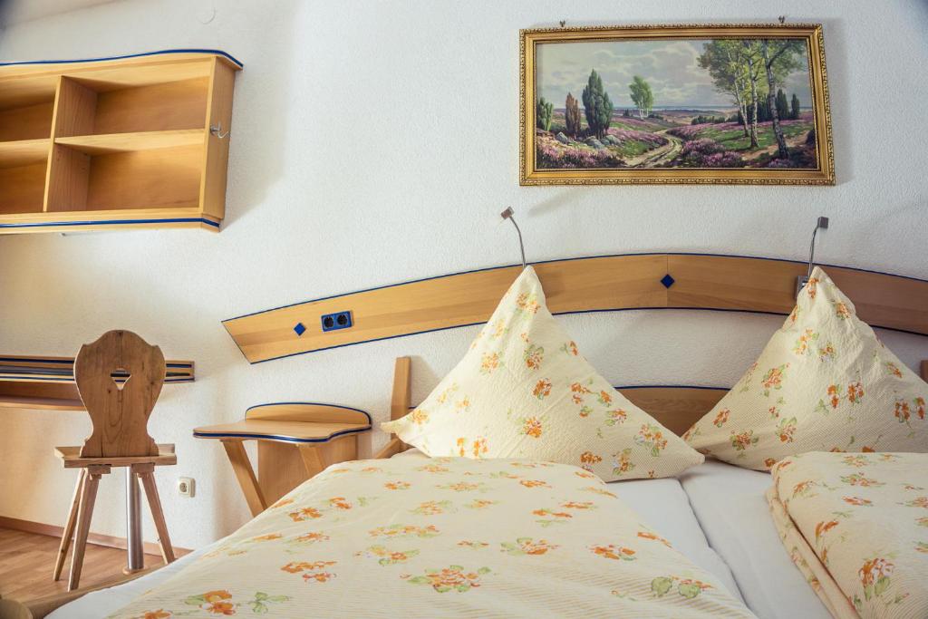 Postel nebo postele na pokoji v ubytování Gasthof Kornbachtal