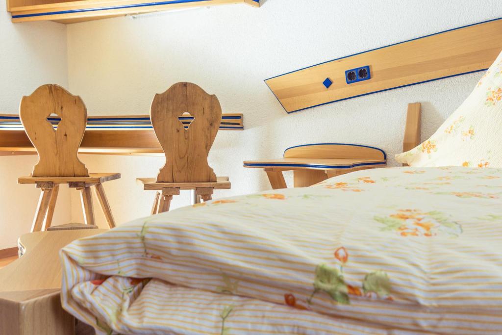 Postel nebo postele na pokoji v ubytování Gasthof Kornbachtal