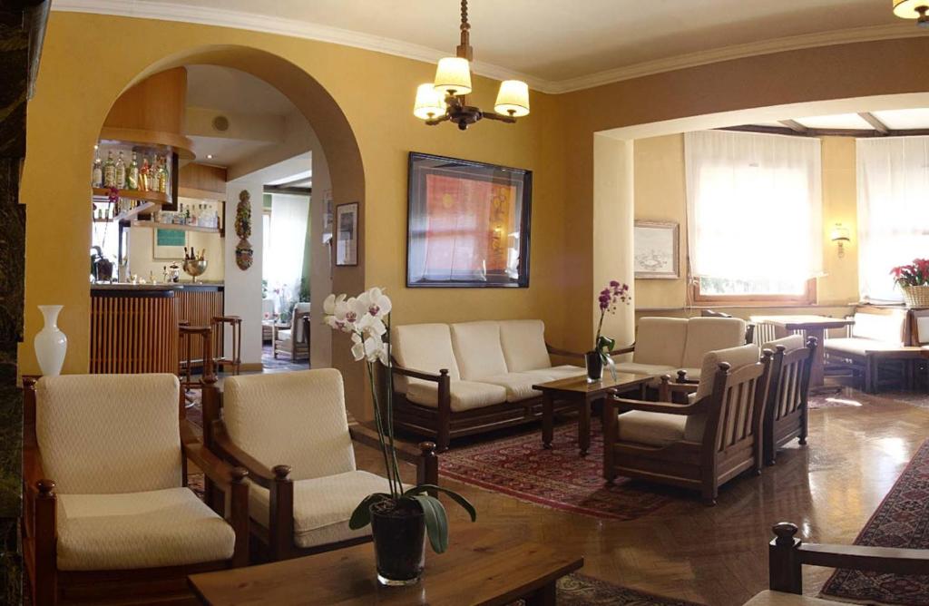 Posezení v ubytování Hotel Des Geneys