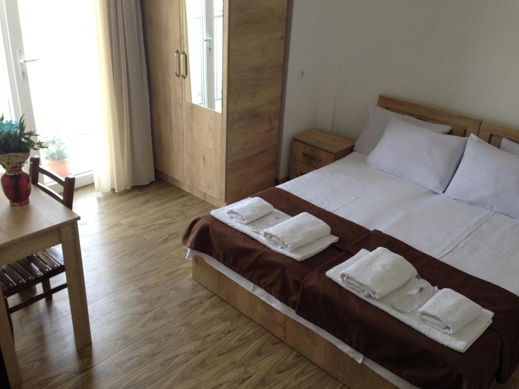 Postel nebo postele na pokoji v ubytování Hotel Continental