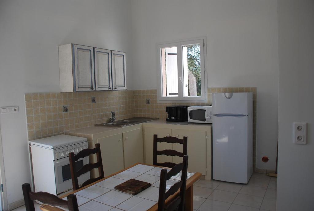 Una cocina o zona de cocina en Residence Ribellinu