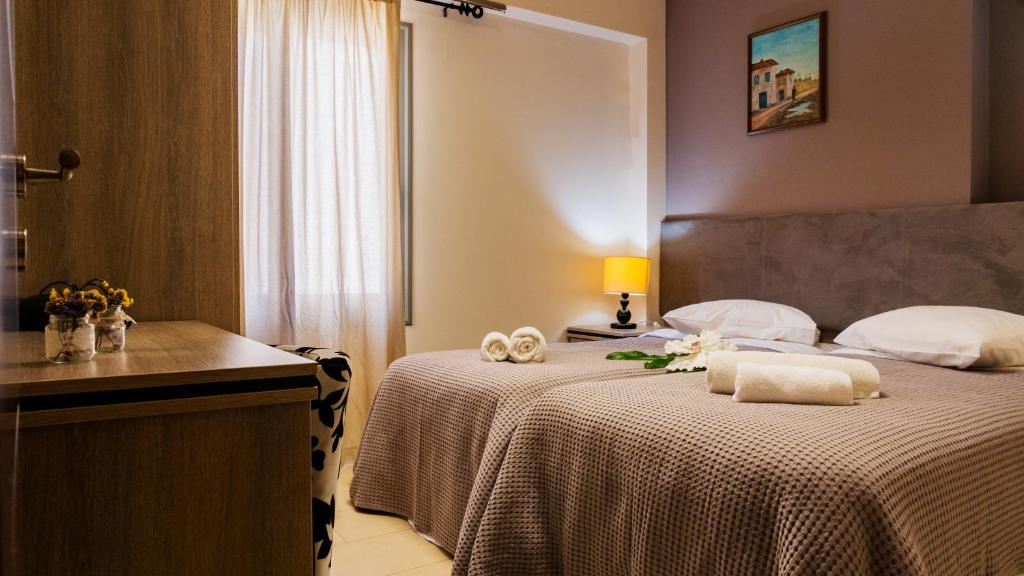 Athenian Central Apartments 객실 침대