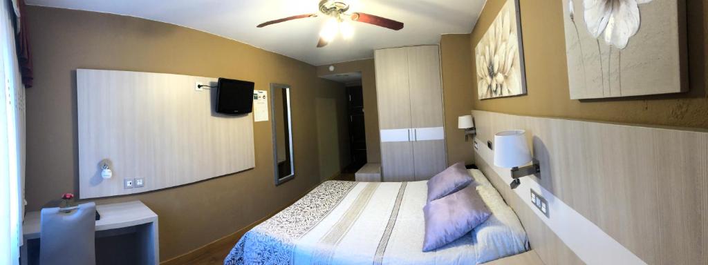 Postel nebo postele na pokoji v ubytování Hotel Bahia