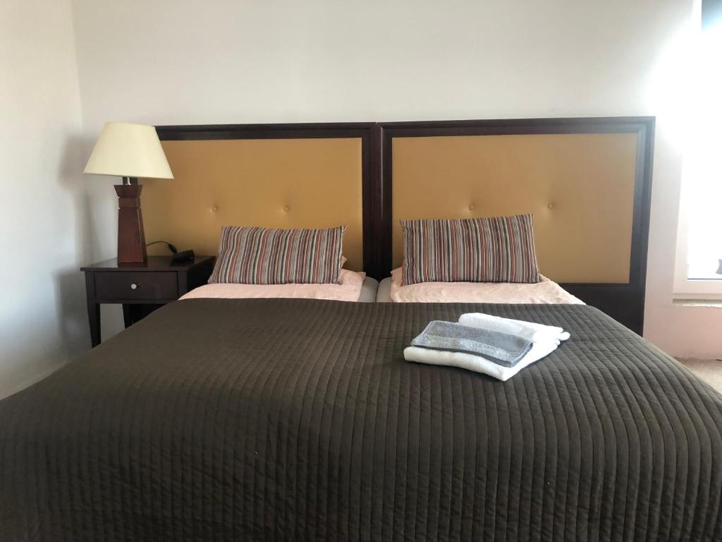 Posteľ alebo postele v izbe v ubytovaní Madera House