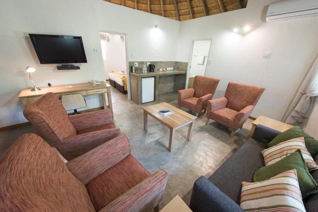 Sefapane Lodge and Safaris - Family Rondavel (4 Adults)