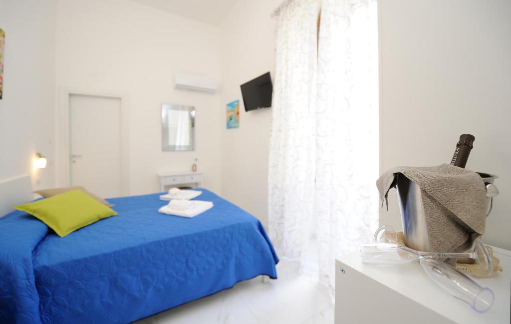 Postel nebo postele na pokoji v ubytování B&B Valentì