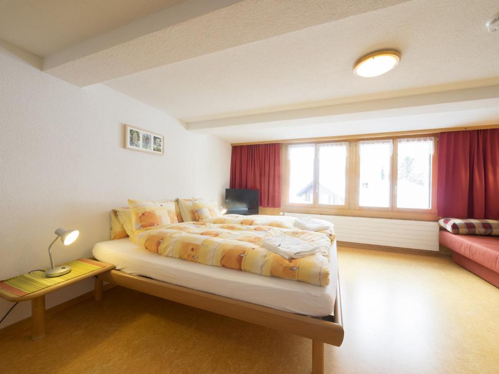 Postel nebo postele na pokoji v ubytování Esthers Guesthouse