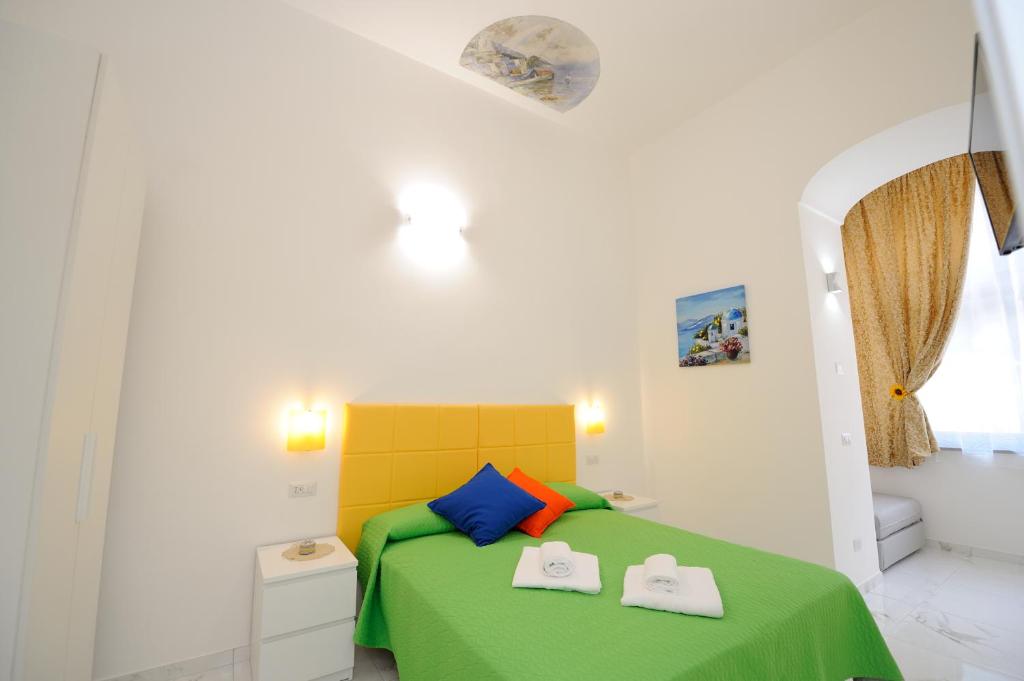 Postel nebo postele na pokoji v ubytování B&B Valentì