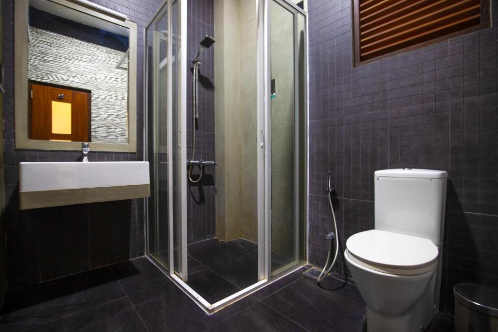 Koupelna v ubytování Kalapuwa Resort