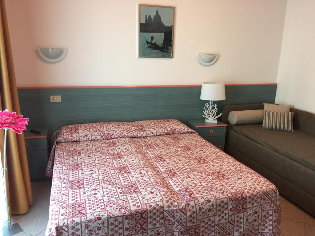 Postel nebo postele na pokoji v ubytování Hotel Storione