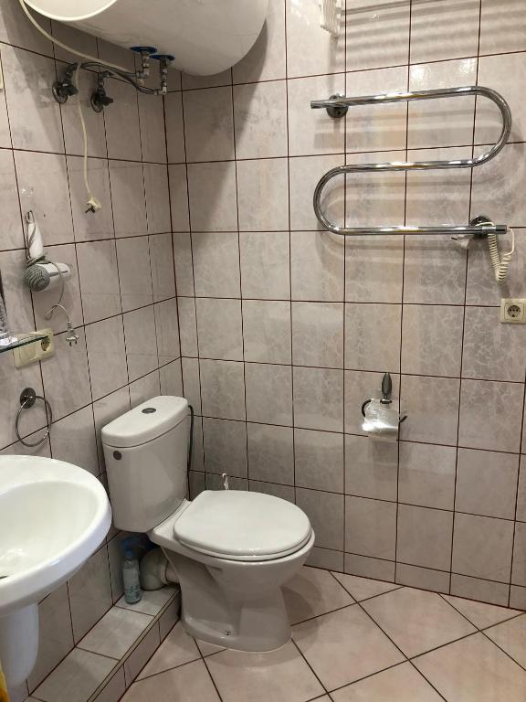 Koupelna v ubytování Apartamentai Viktorija