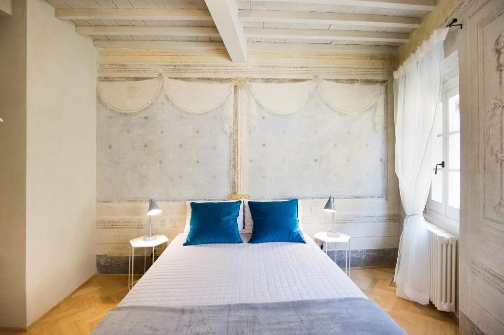 Posteľ alebo postele v izbe v ubytovaní Il Piccolo Cavour Charming House B&B