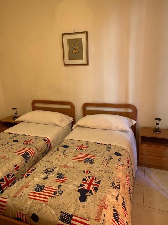 Postel nebo postele na pokoji v ubytování HOTEL ELENA