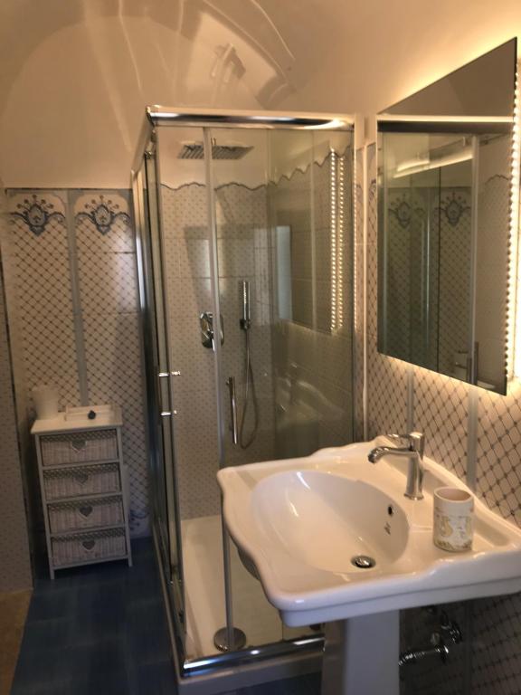 a bathroom with a sink and a shower at Casa Cardi in Sperlonga