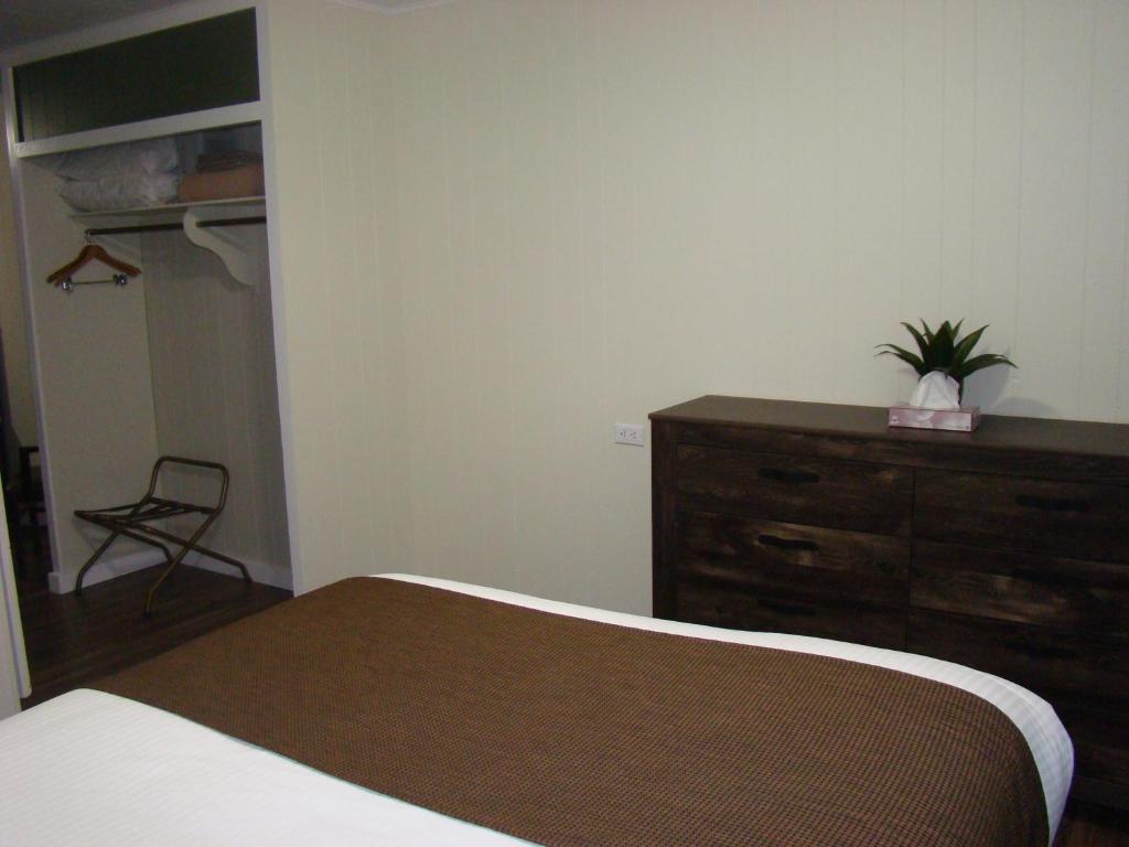 Postel nebo postele na pokoji v ubytování Paddock Inn