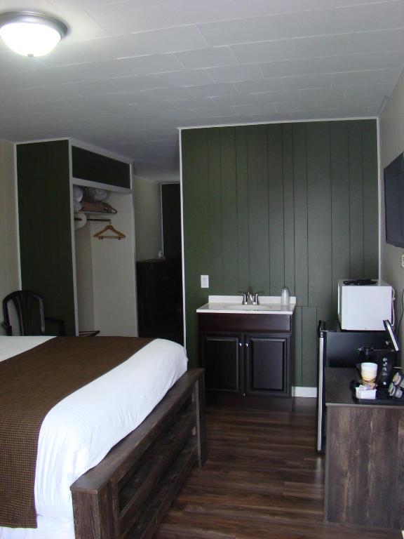Postel nebo postele na pokoji v ubytování Paddock Inn