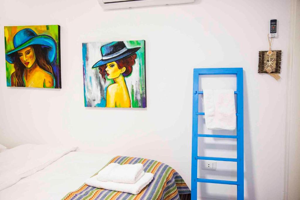 Postel nebo postele na pokoji v ubytování Old Town Guesthouses